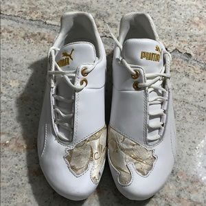 Puma shoes with satin gold detail